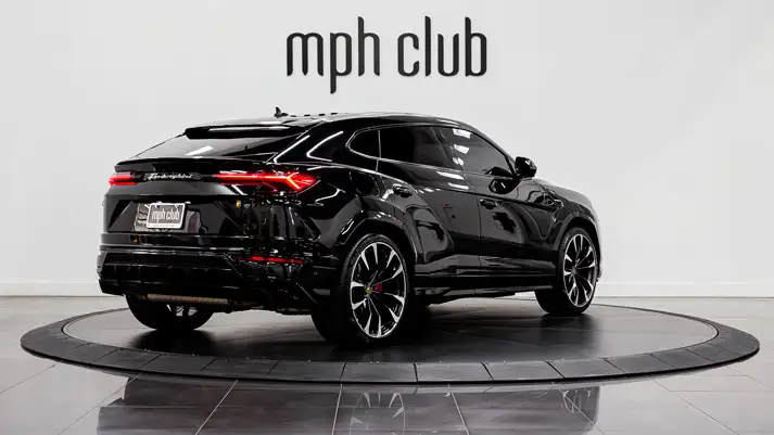 Black on red Lamborghini Urus for rent rear view - mph club