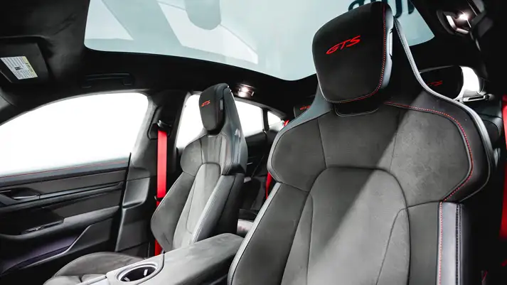 Blue Porsche Taycan rental interior view - mph club