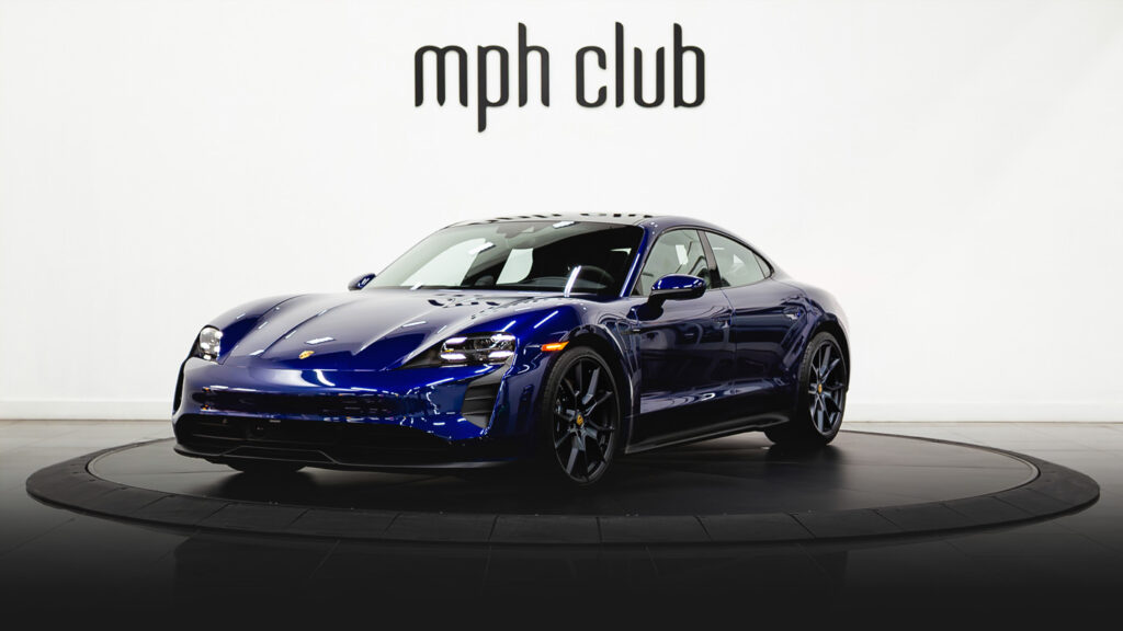 Blue Porsche Taycan rental profile view - mph club