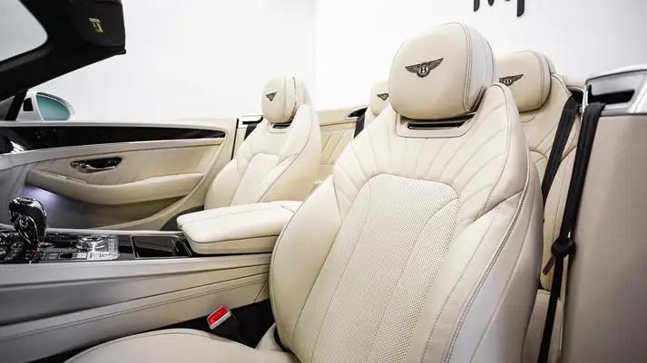 White on white Bentley Continental GTC rental interior view - mph club