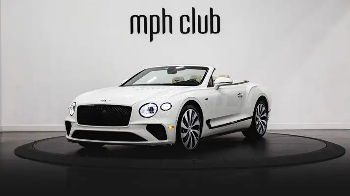 White on white Bentley Continental GTC rental profile view rszd - mph club