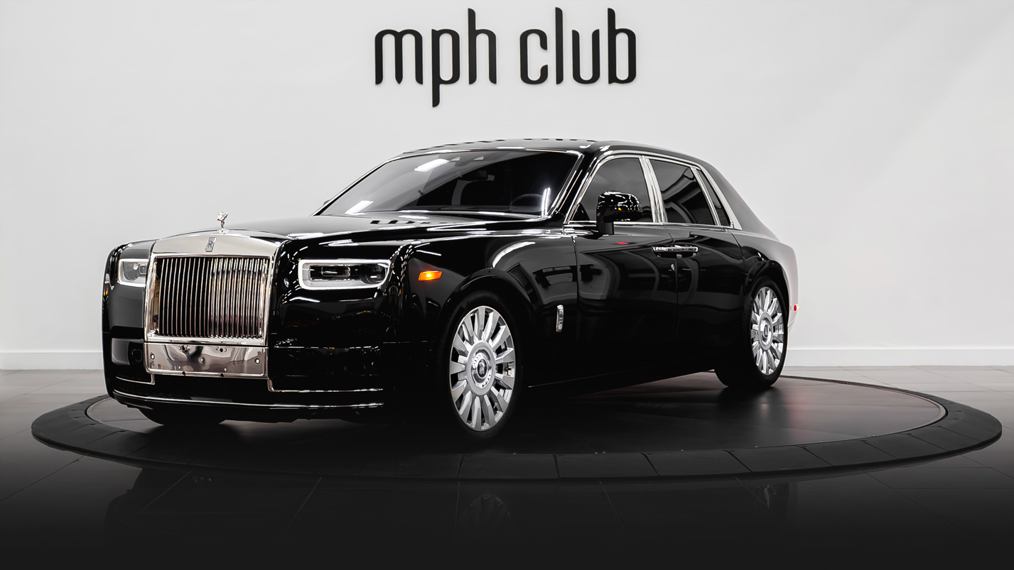 Black on orange Rolls Royce Phantom rental profile view - mph club