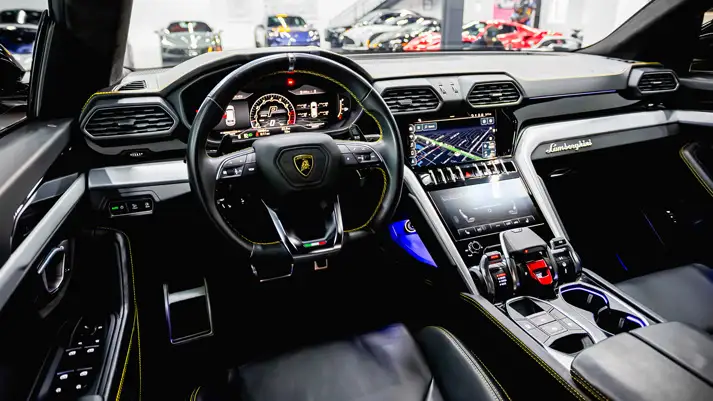 Black on yellow Lamborghini Urus rental dashboard view - mph club