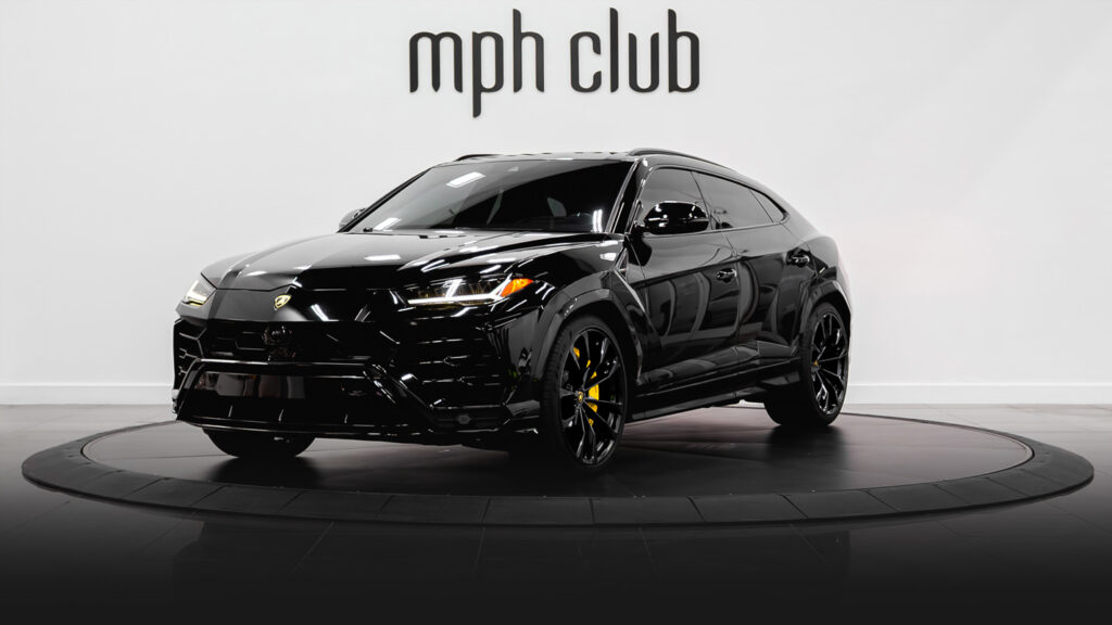 Black on yellow Lamborghini Urus rental profile view - mph club