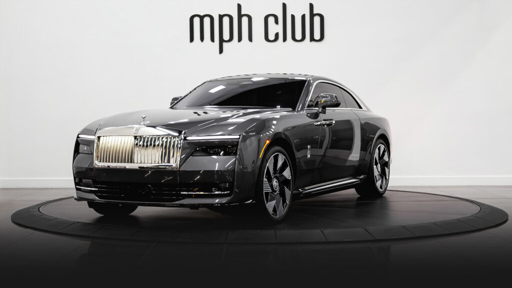 Dark grey Rolls Royce Spectre rental profile view - mph club