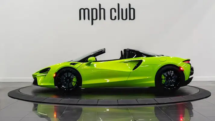 Green McLaren Artura for rent side view - mph club
