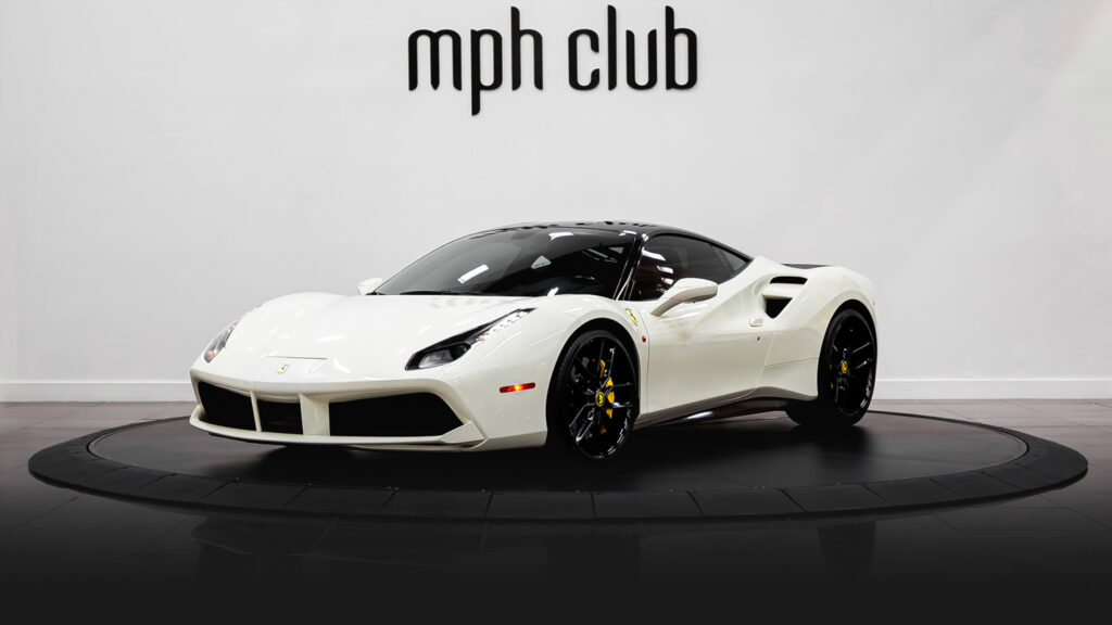 White on black Ferrari 488 GTB rental profile view - mph club
