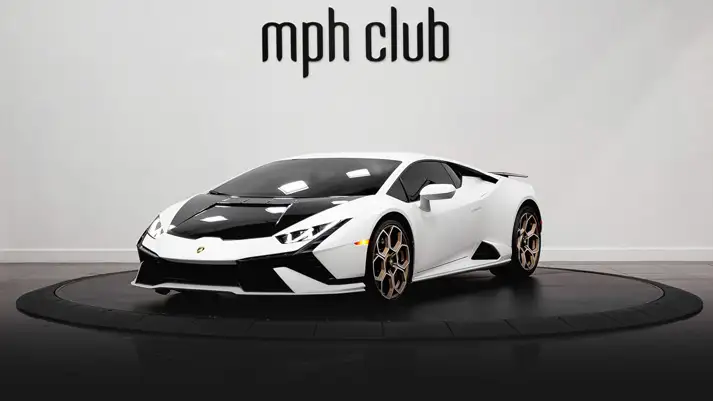 White on black Lamborghini Huracan Tecnica rental profile view rszd - mph club