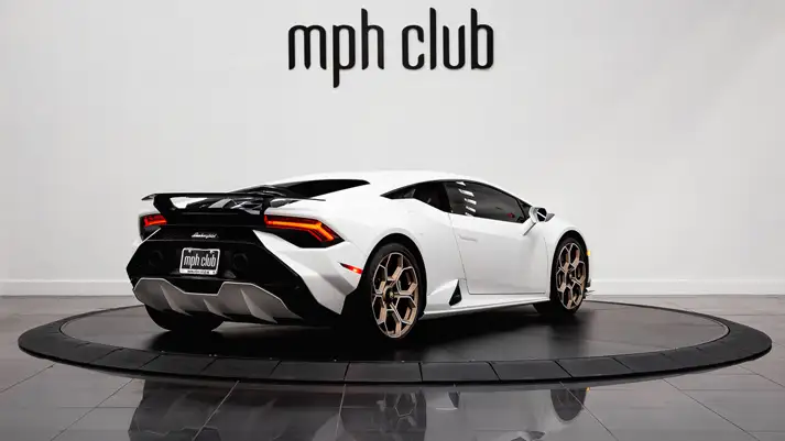 White on black Lamborghini Huracan Tecnica rental rear view - mph club