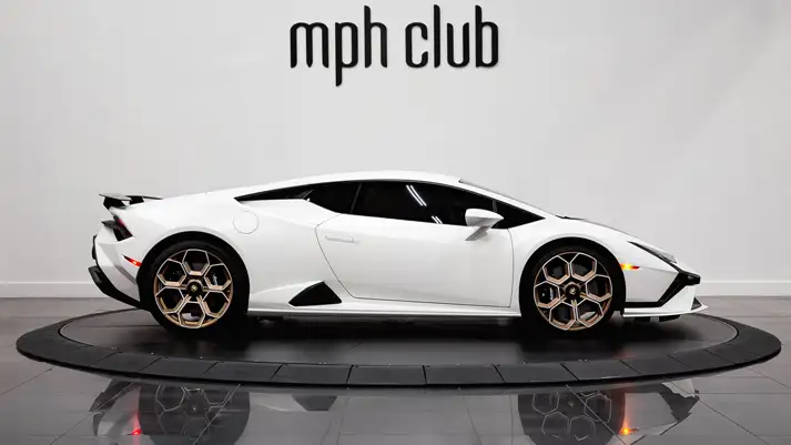 White on black Lamborghini Huracan Tecnica rental side view - mph club