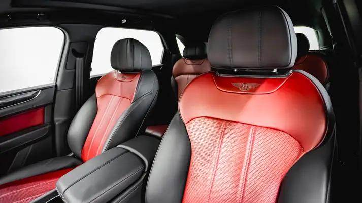 Black on red Bentley Bentayga rental interior view - mph club