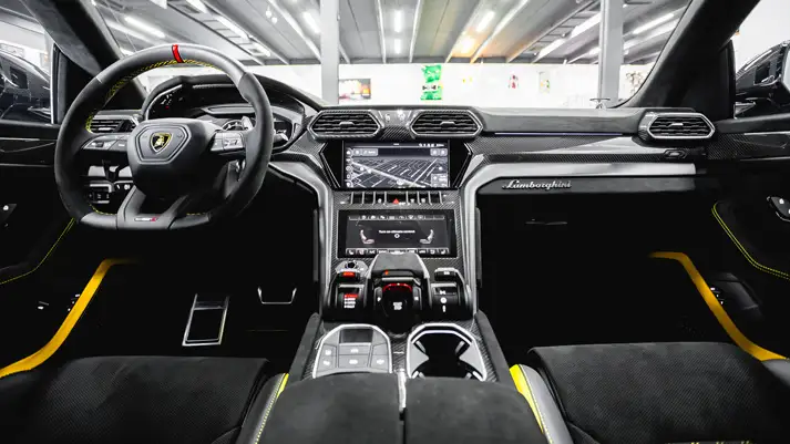 Black on yellow Lamborghini Urus Performante rental dashboard view - mph club