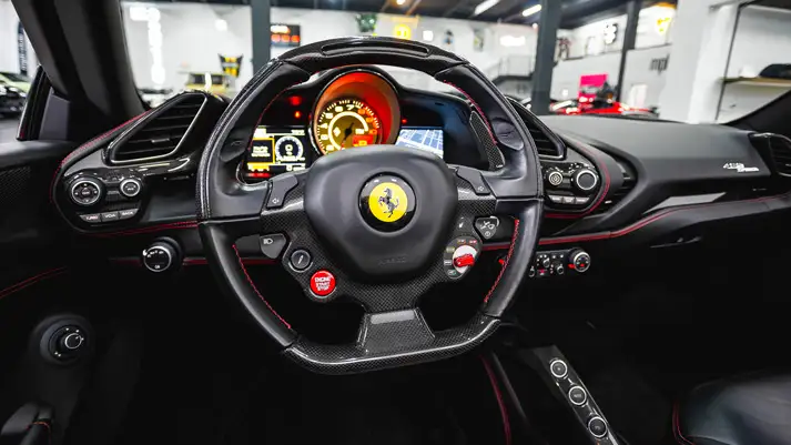 Red Ferrari 488 Spider for rent dashboard view - mph club