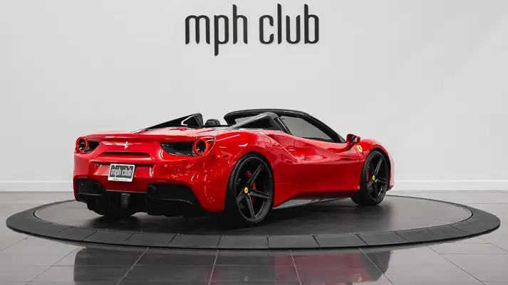 Red Ferrari 488 Spider for rent rear view - mph club