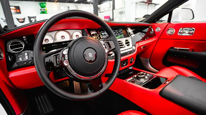White on red Rolls Royce Dawn rental dashboard view - mph club