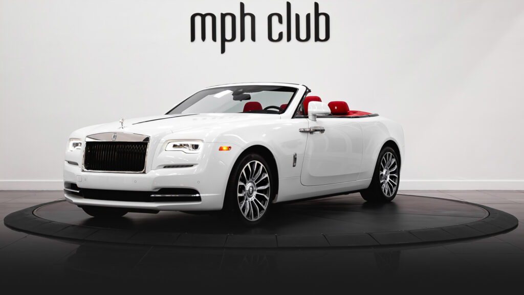 White on red Rolls Royce Dawn rental profile view - mph club