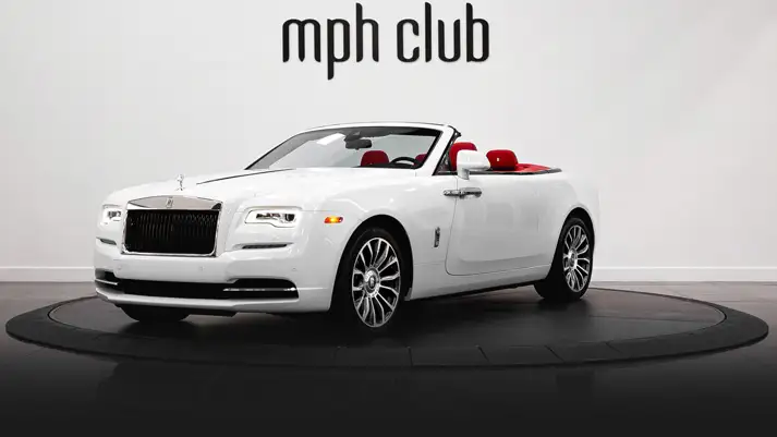White on red Rolls Royce Dawn rental profile view rszd - mph club