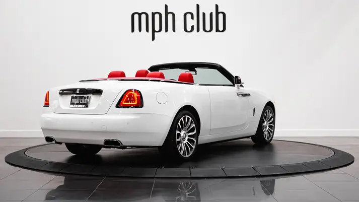 White on red Rolls Royce Dawn rental rear view - mph club