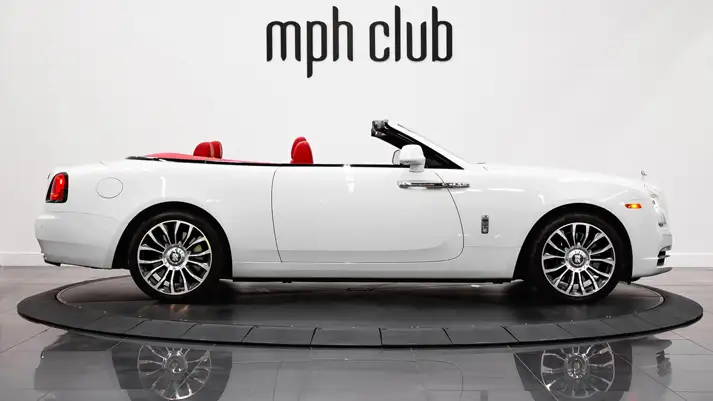White on red Rolls Royce Dawn rental side view - mph club