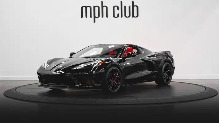 Black on red Corvette C8 rental profile view rszd - mph club