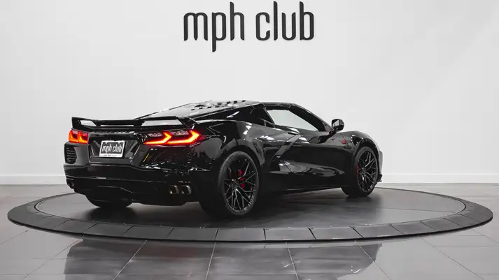 Black on red Corvette C8 rental rear view - mph club