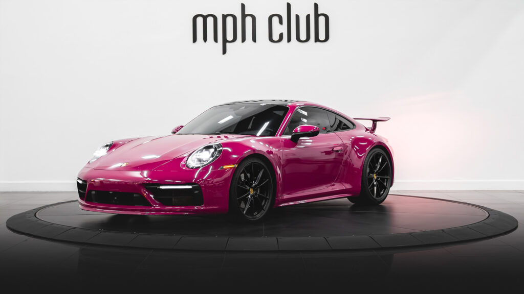 Pink Porsche 911 Carrera 4S rental profile view - mph club