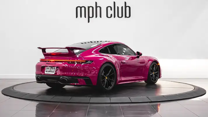 Pink Porsche 911 Carrera 4S rental rear view - mph club