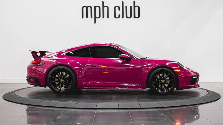 Pink Porsche 911 Carrera 4S rental side view - mph club
