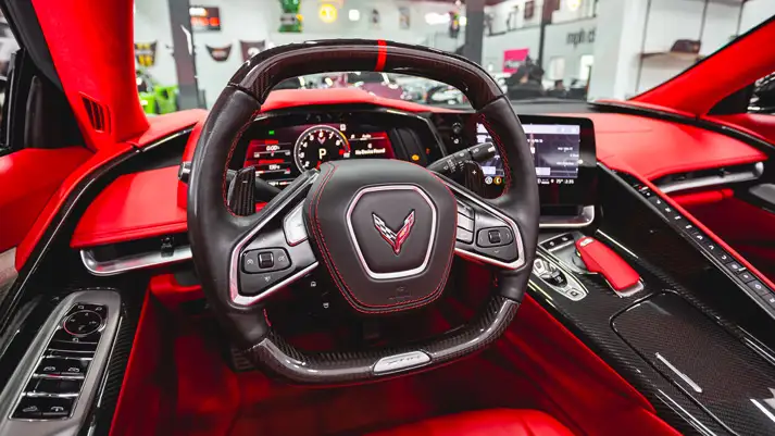 Silver Chevrolet Corvette Z06 rental dashboard view - mph club