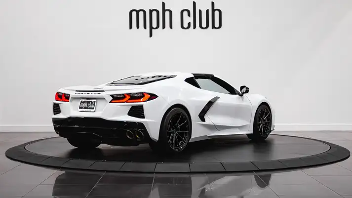 White with red Chevrolet Corvette C8 rental rear view - mph club