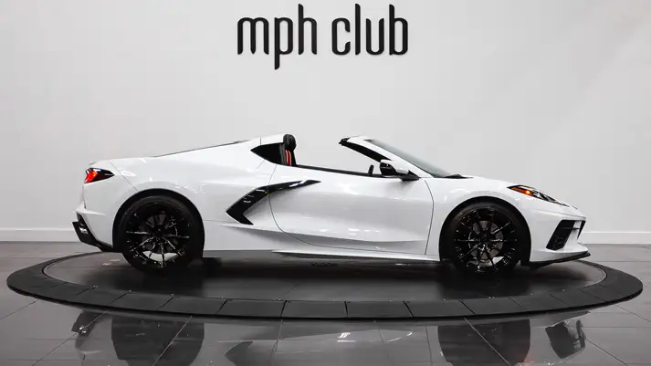 White with red Chevrolet Corvette C8 rental side view - mph club