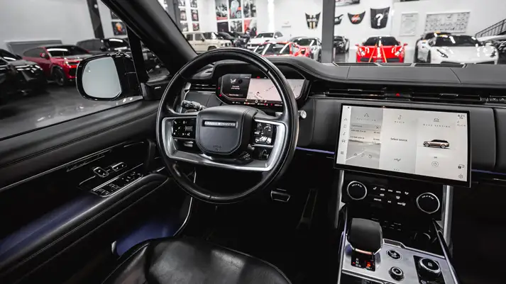 Black on black Range Rover LWB rental dashboard view - mph club