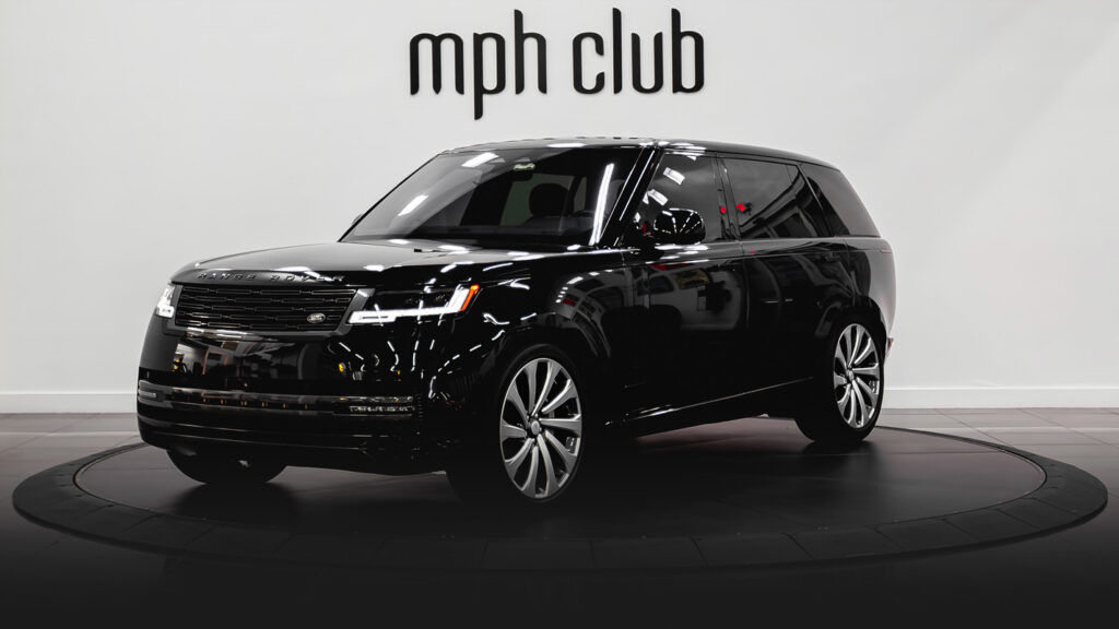 Black on black Range Rover LWB rental profile view - mph club