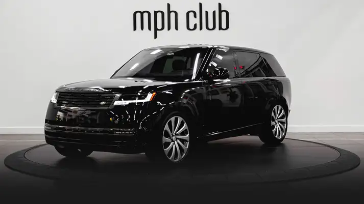 Black on black Range Rover LWB rental rear view rszd - mph club