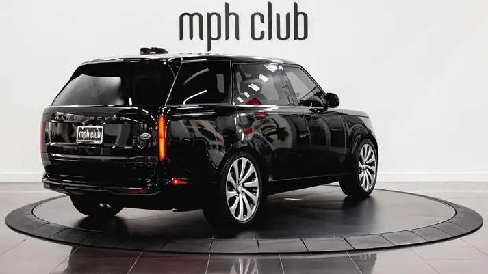 Black on black Range Rover LWB rental rear view - mph club