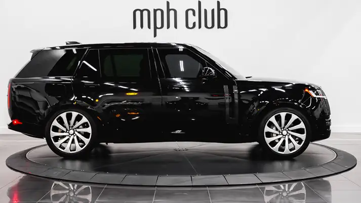 Black on black Range Rover LWB rental side view - mph club
