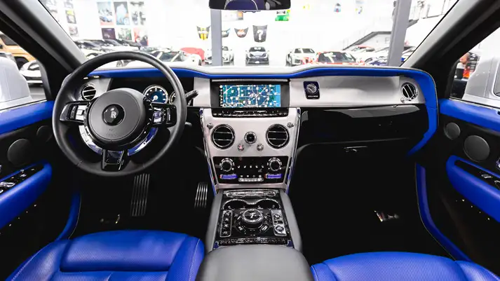 White on blue Rolls Royce Cullinan rental dashboard view - mph club