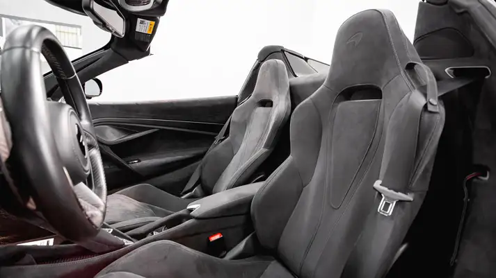 Black on black McLaren 720s Spider rental interior view - mph club