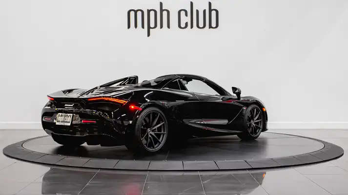 Black on black McLaren 720s Spider rental rear view - mph club
