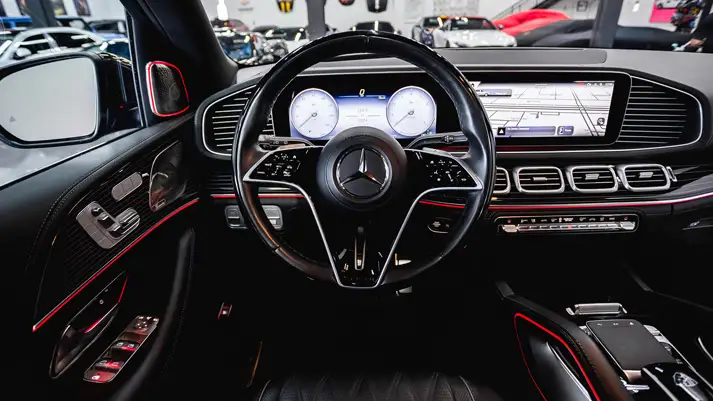 Black on black Mercedes Maybach SUV rental dashboard view - mph club