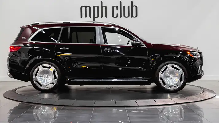 Black on black Mercedes Maybach SUV rental side view - mph club