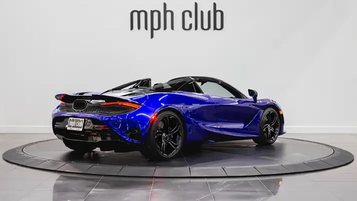 Blue McLaren 750s rental rear view - mph club