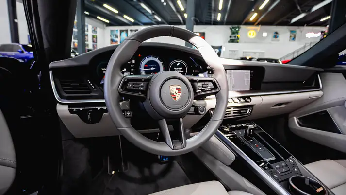 Blue Porsche 911 Turbo S rental dashboard view - mph club
