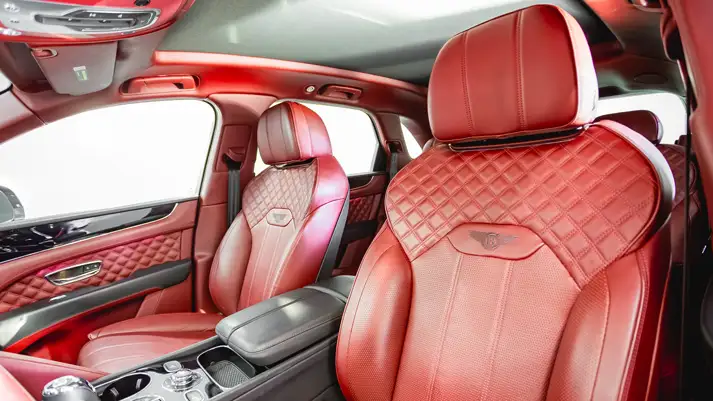 Grey on red Bentley Bentayga rental interior view - mph club