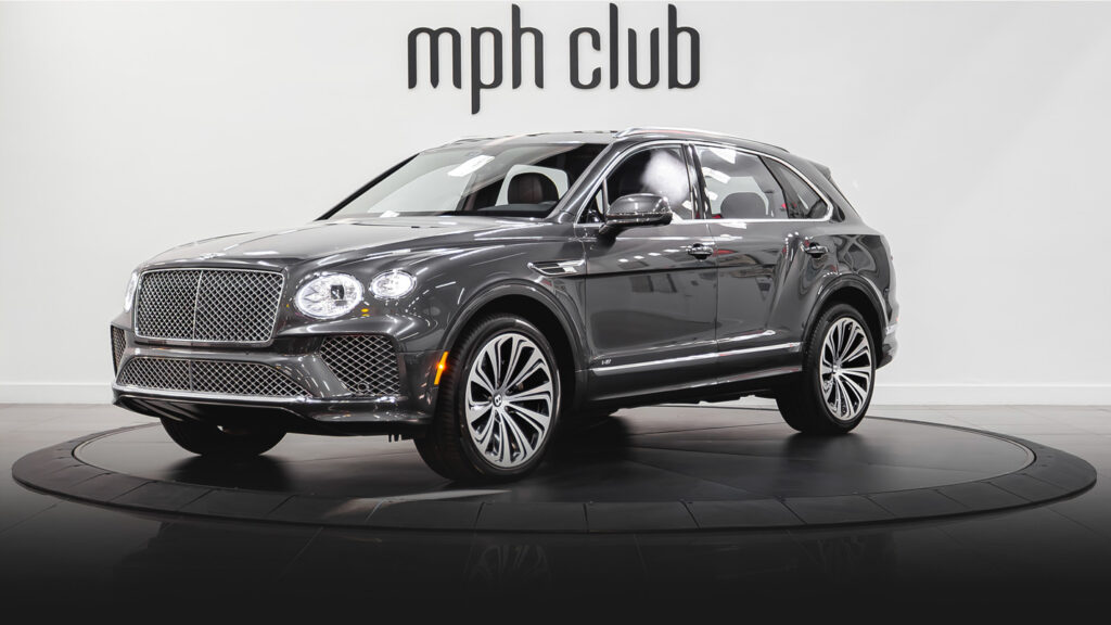 Grey on red Bentley Bentayga rental profile view - mph club