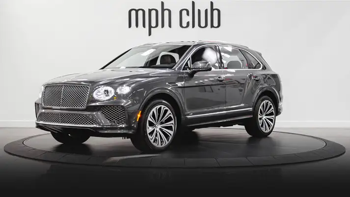 Grey on red Bentley Bentayga rental profile view rszd - mph club