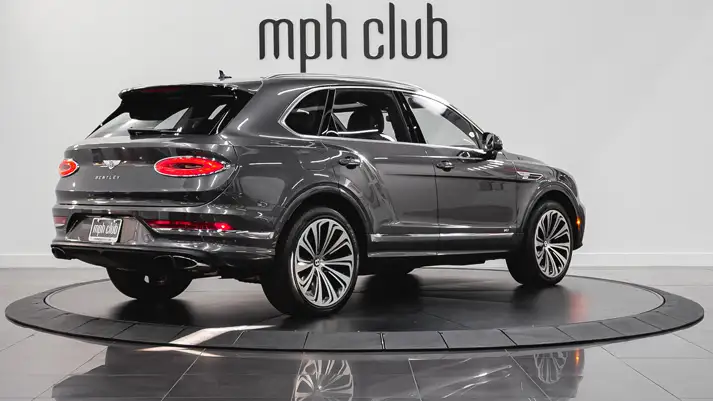 Grey on red Bentley Bentayga rental rear view - mph club