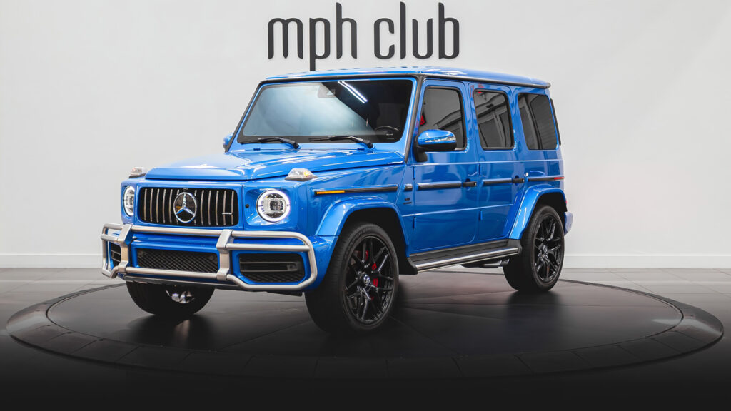 Lite blue Mercedes Benz G63 rental profile view - mph club