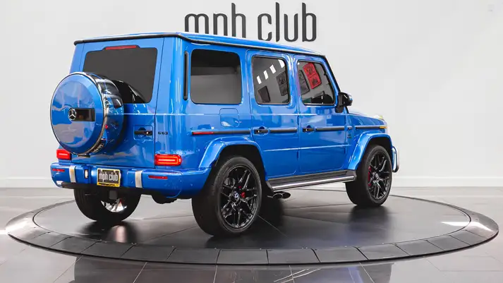 Lite blue Mercedes Benz G63 rental rear view - mph club
