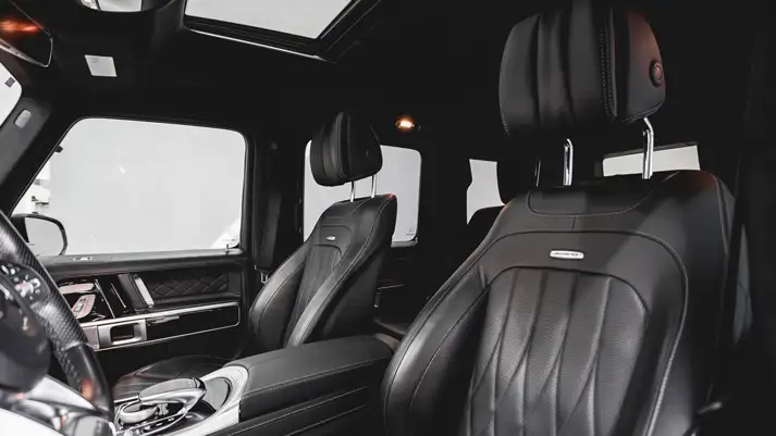 Matte black on black Mercedes Benz G63 AMG G Wagon rental interior view - mph club